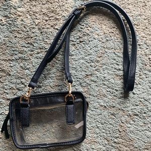 Clear bag with black siding.
